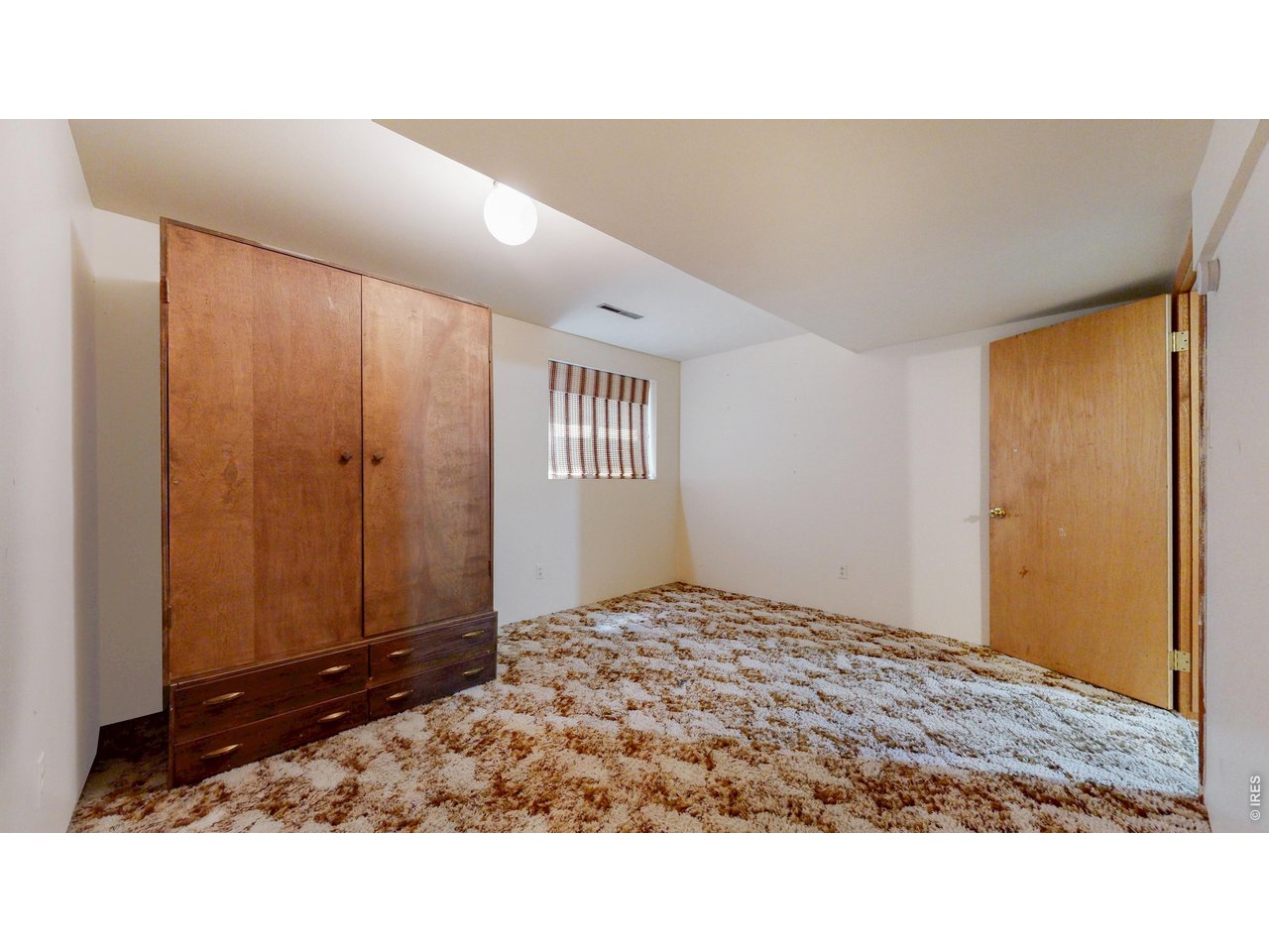1009 Club View Road Fort Collins, CO 80524 - Photo 23 of 39 Basement bedroom 4 - nonconforming