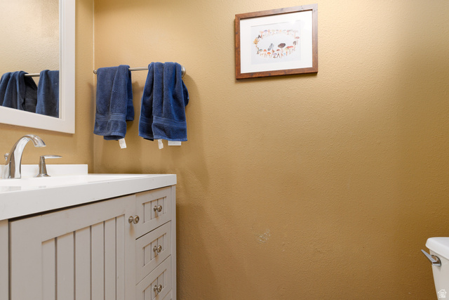 3902 Beaver Creek Road Kamas, UT 84036 - Photo 18 of 33 Half bath featuring vanity and toilet