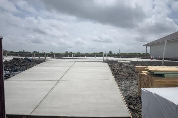 a view of a terrace with yard