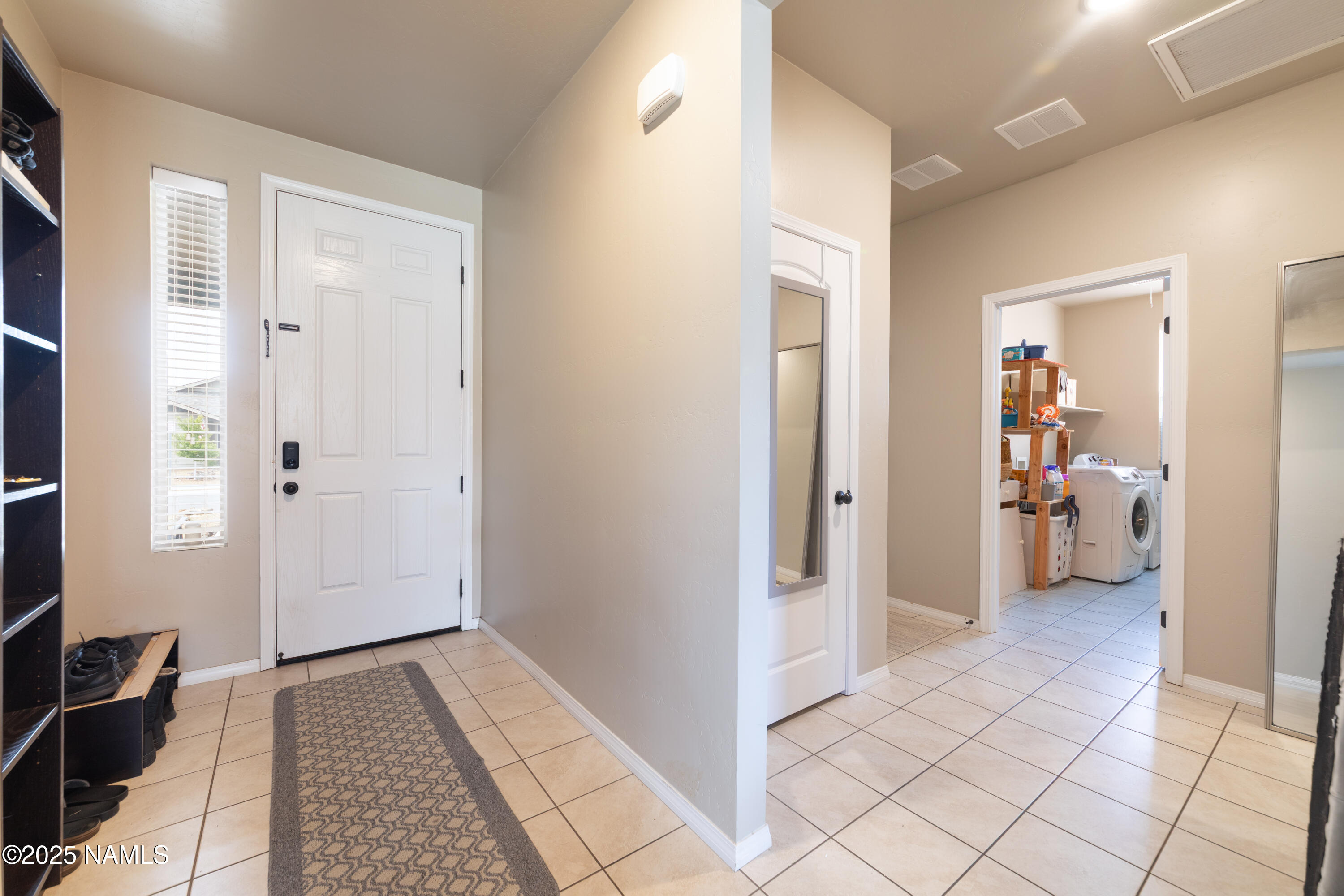4500 Centaurus Road Bellemont, AZ 86015 - Photo 2 of 20 a bathroom with a sink and a mirror