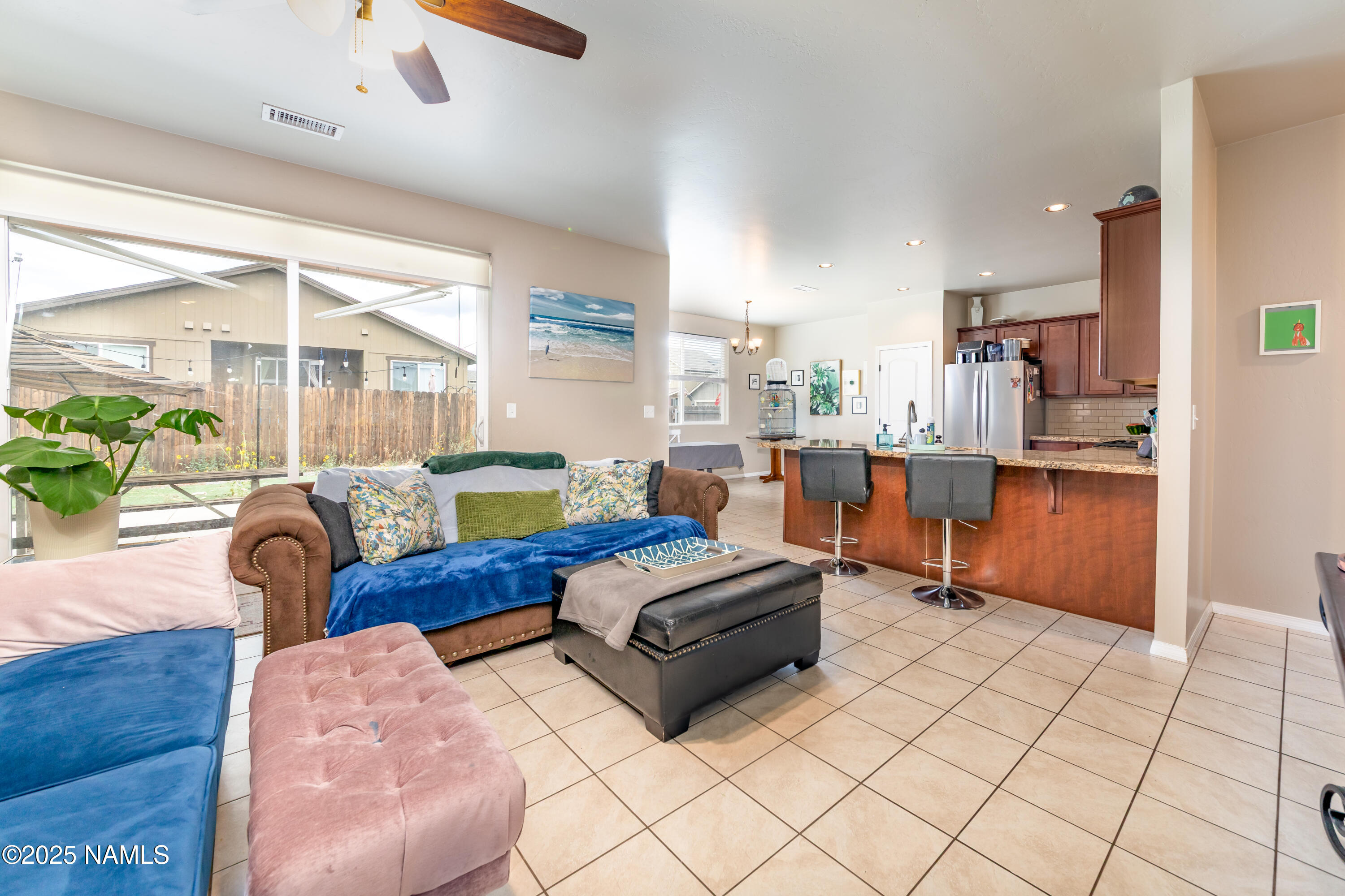 4500 Centaurus Road Bellemont, AZ 86015 - Photo 5 of 20 a living room with furniture and a large window