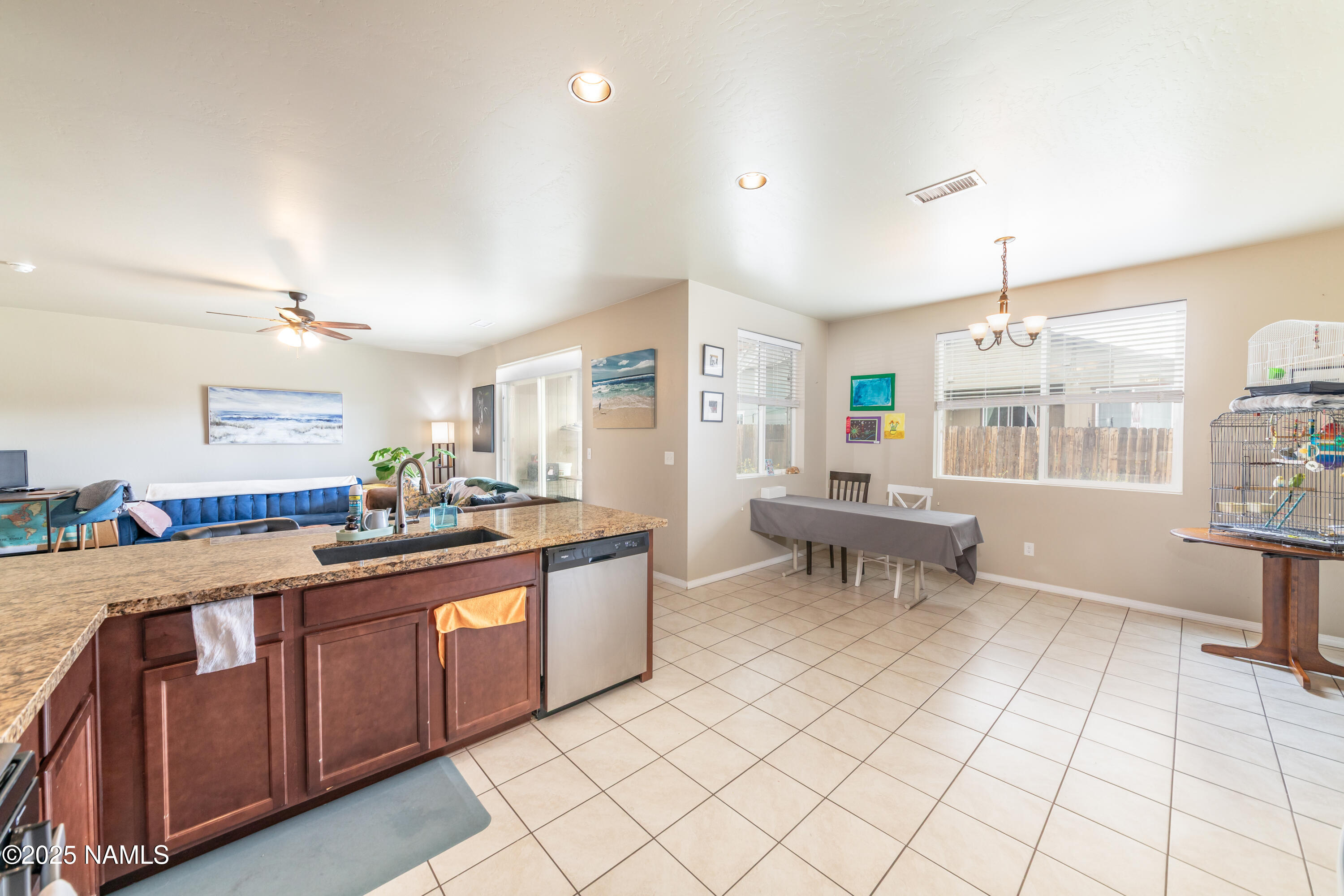 4500 Centaurus Road Bellemont, AZ 86015 - Photo 7 of 20 a kitchen with granite countertop a sink and cabinets