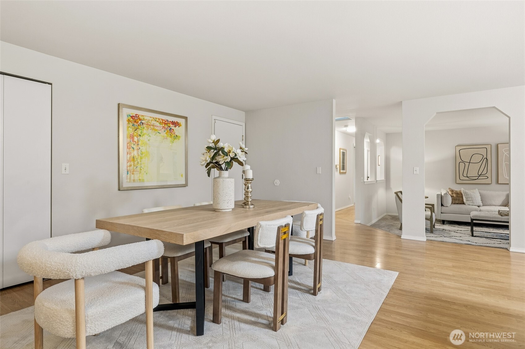 23506 13th Place West Bothell, WA 98021 - Photo 11 of 26 a view of a dining room with furniture and wooden floor