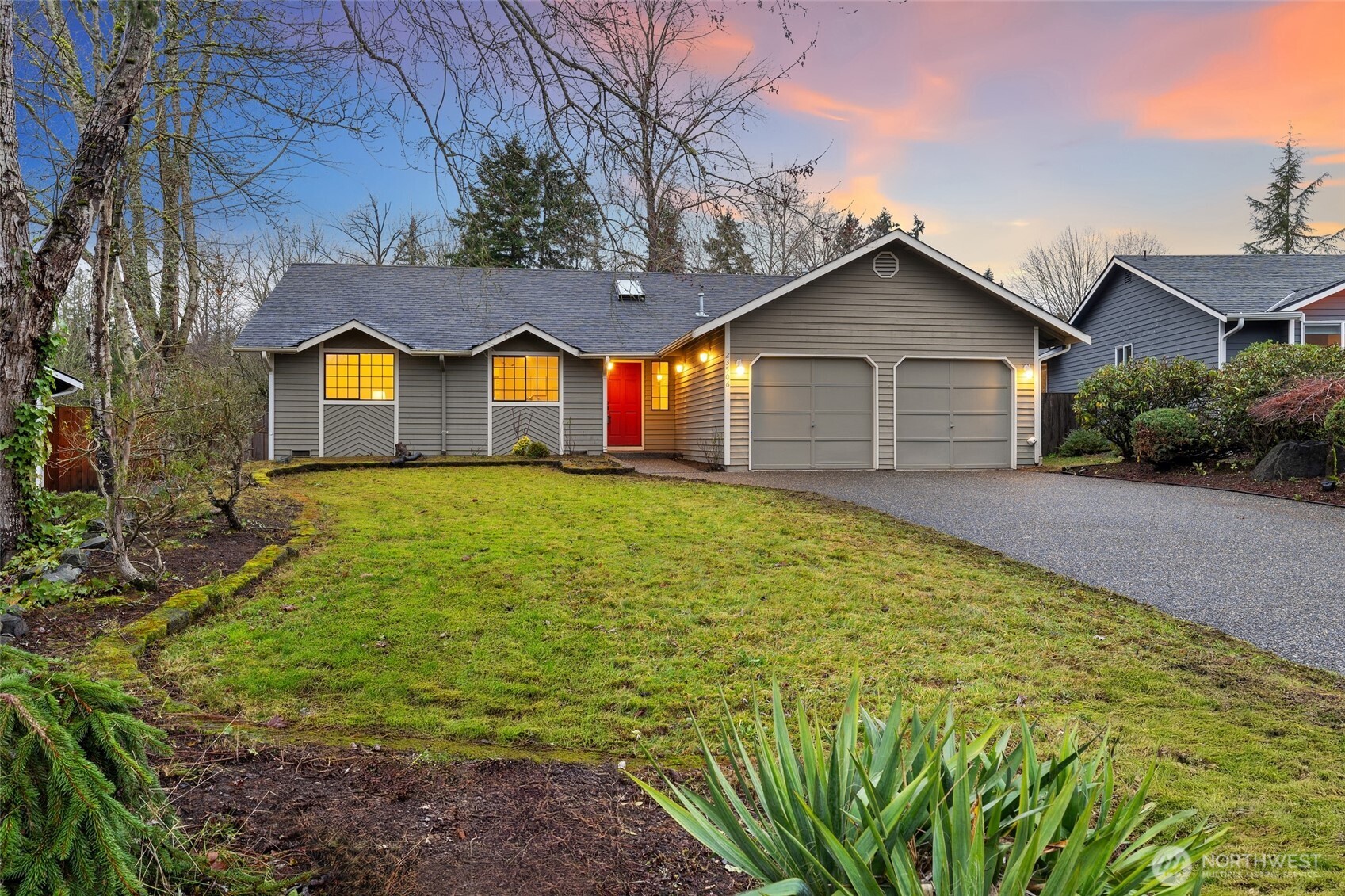 23506 13th Place West Bothell, WA 98021 - Photo 2 of 26 a front view of house with yard and green space