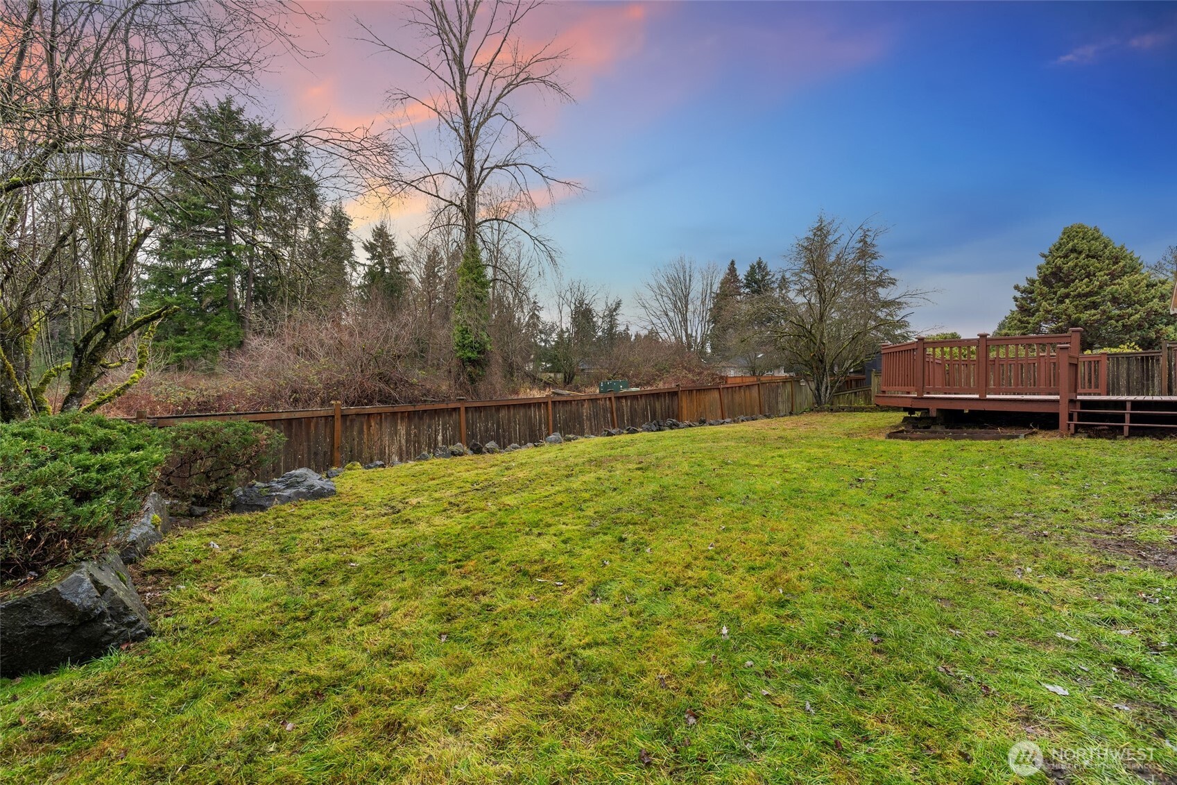 23506 13th Place West Bothell, WA 98021 - Photo 21 of 26 a backyard of a house with lots of green space