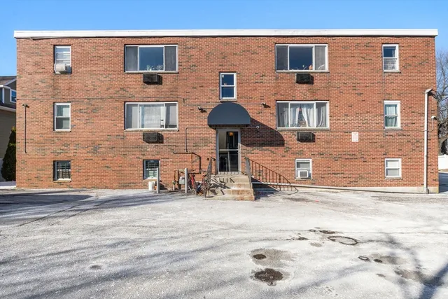 a front view of a house with yard