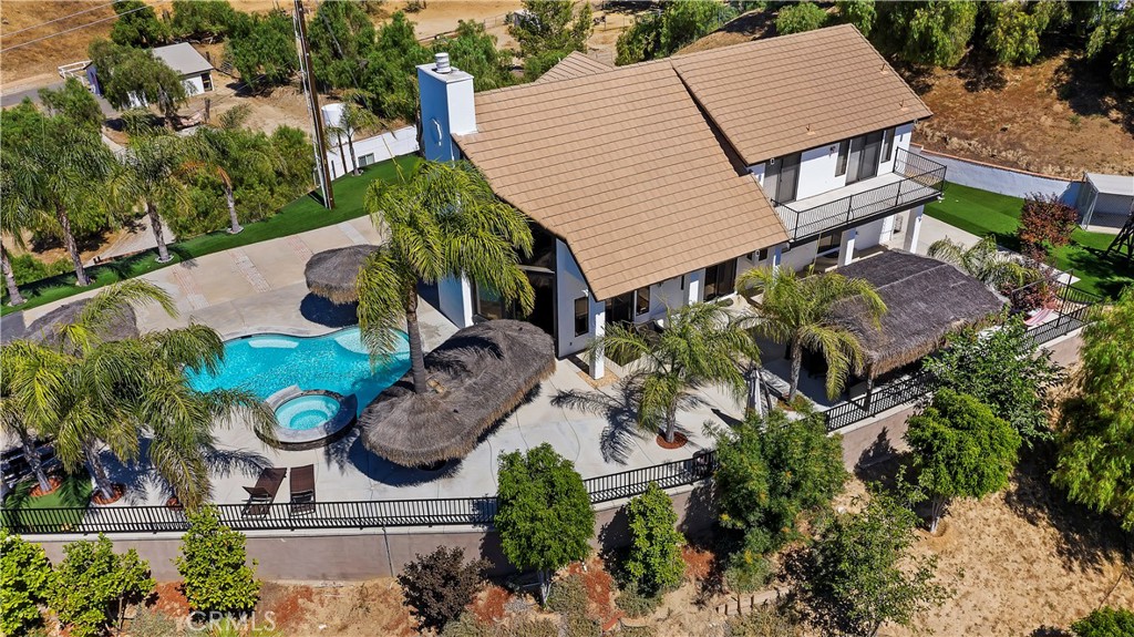 7710 Stewart Road Colton, CA 92324 - Photo 1 of 1 an aerial view of a house having yard