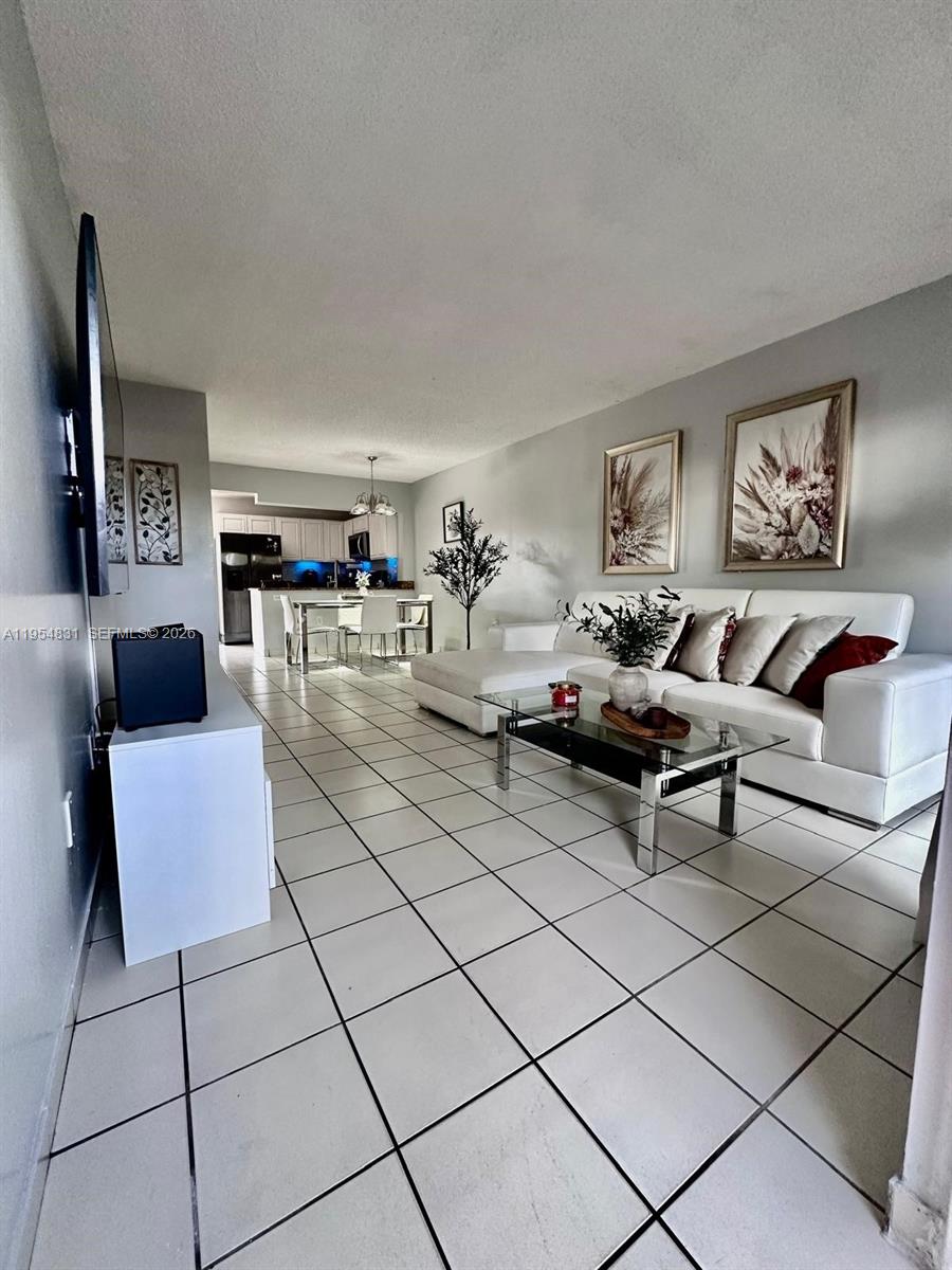 a living room with furniture and a couch