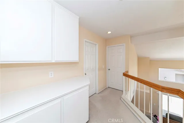 a view of hallway with stairs