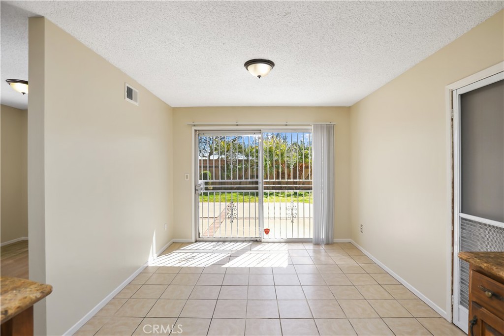 15902 King Circle Westminster, CA 92683 - Photo 12 of 43 a view of an empty room with a window