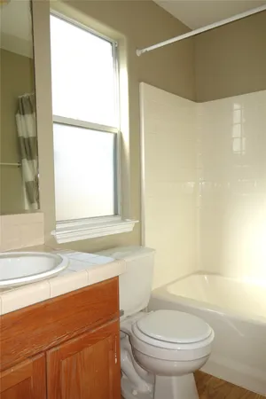 a bathroom with a sink and a toilet
