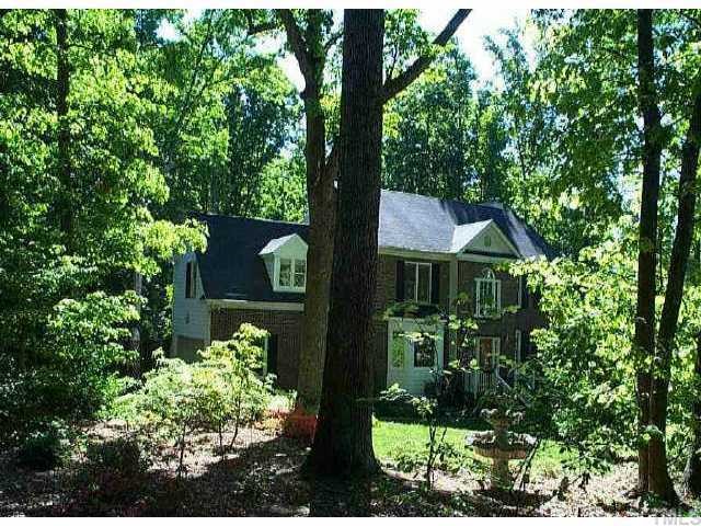107 Hemingway Forest Place Raleigh, NC 27607 - Photo 1 of 1 a front view of a house with a yard