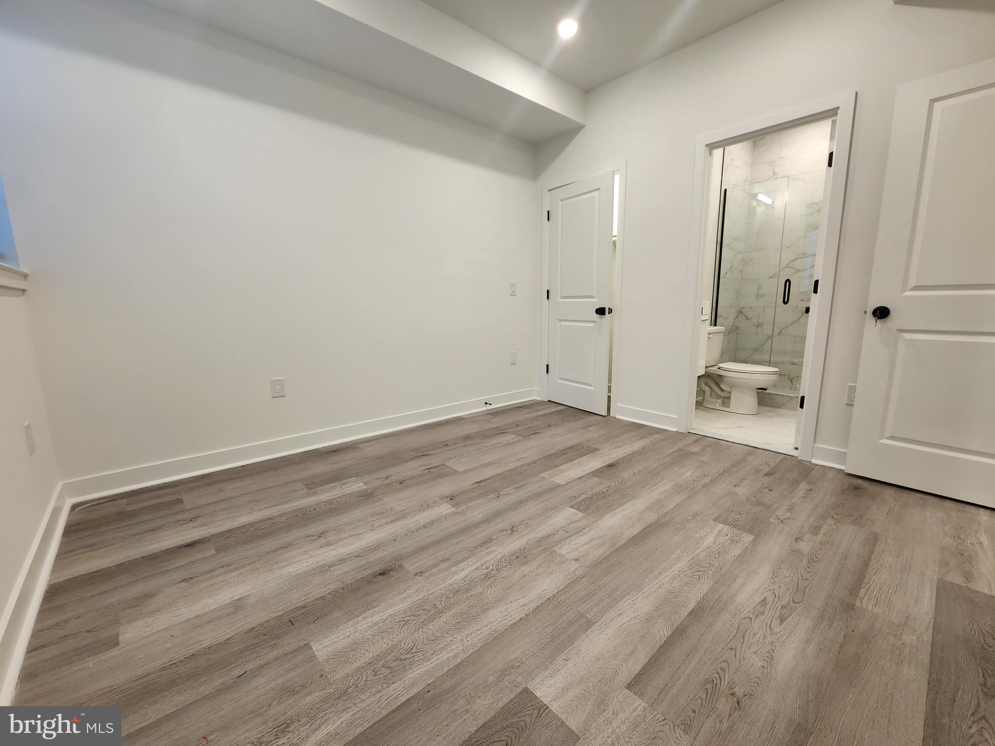 1838 North 17th Street, Unit 3 Philadelphia, PA 19121 - Photo 6 of 14 a view of room with wooden floor