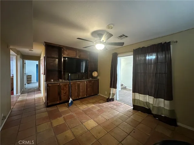 a view of a elevator with wooden floor