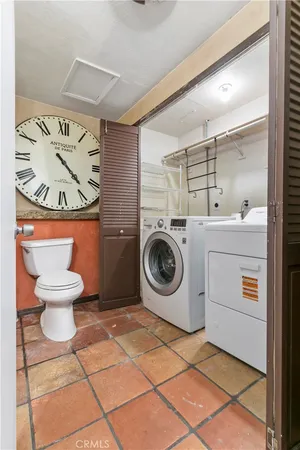 a view of a bathroom with a washer and dryer
