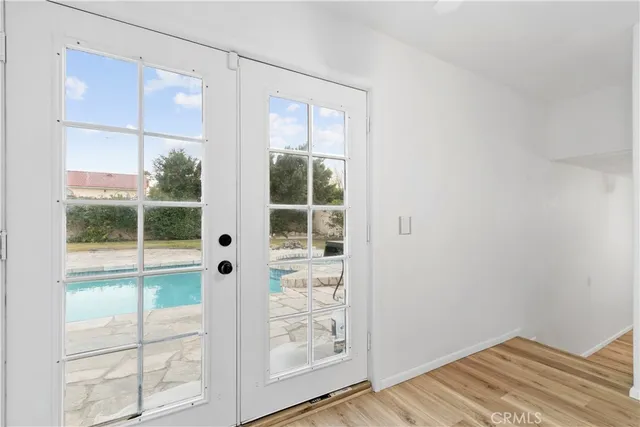 a view of a swimming pool with a patio