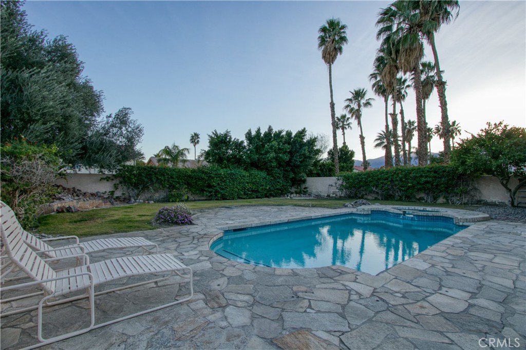 68295 Marina Road Cathedral City, CA 92234 - Photo 27 of 39 a view of a swimming pool with a patio