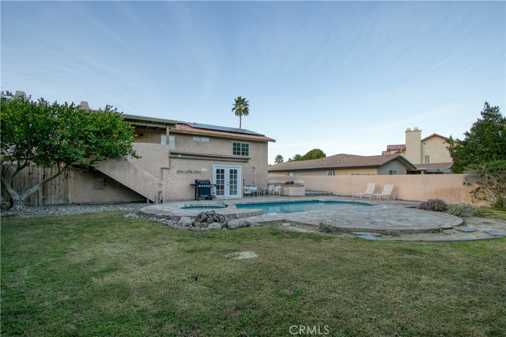 68295 Marina Road Cathedral City, CA 92234 - Photo 29 of 39 a view of a house with a yard and sitting area