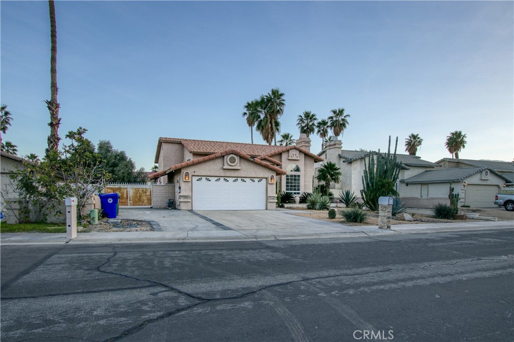 68295 Marina Road Cathedral City, CA 92234 - Photo 38 of 39 a view of street along with trees