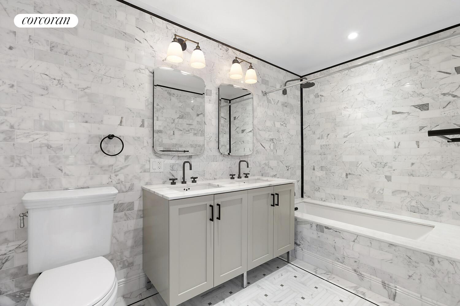 265 State Street, Unit 812 Brooklyn, NY 11201 - Photo 5 of 6 a bathroom with a sink toilet and shower