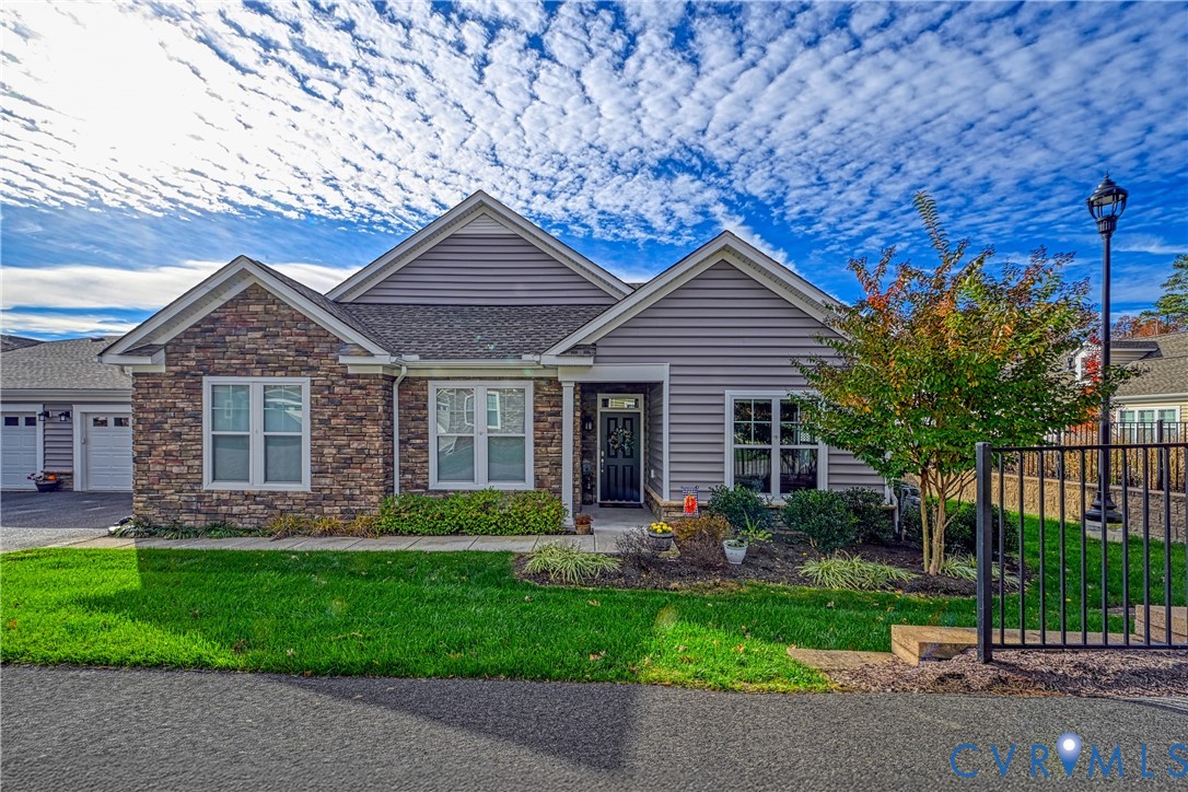 1009 Woodlet Meadow Lane Richmond, VA 23236 - Photo 2 of 44 front view of a house with a yard
