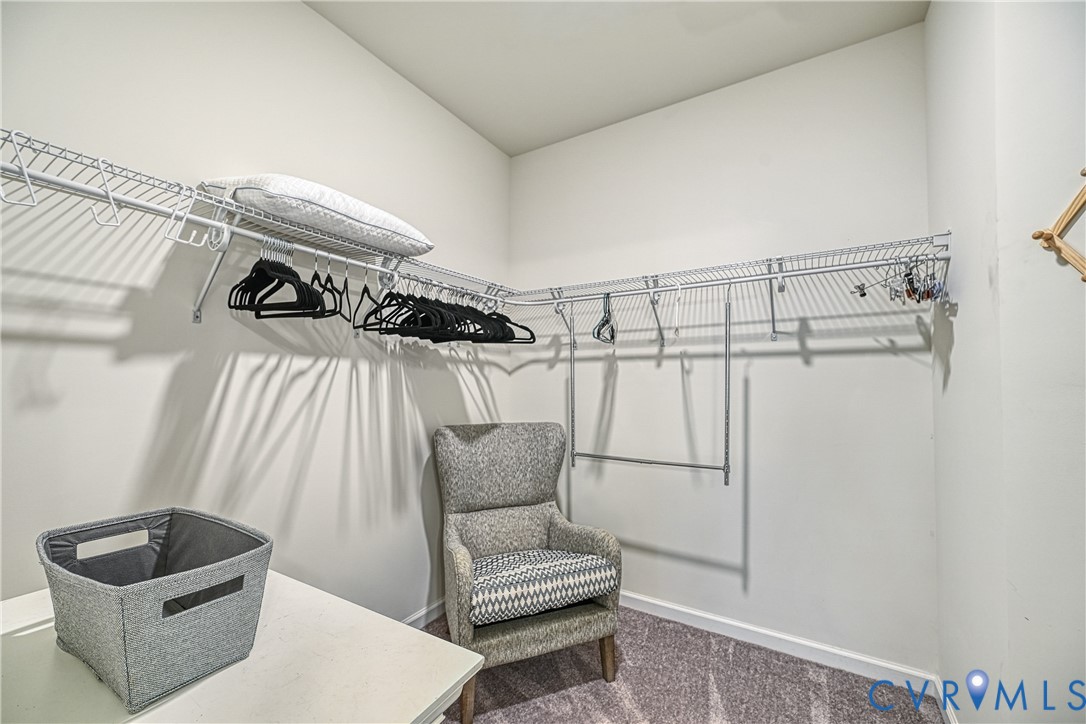 1009 Woodlet Meadow Lane Richmond, VA 23236 - Photo 25 of 44 a living room with furniture and a couch