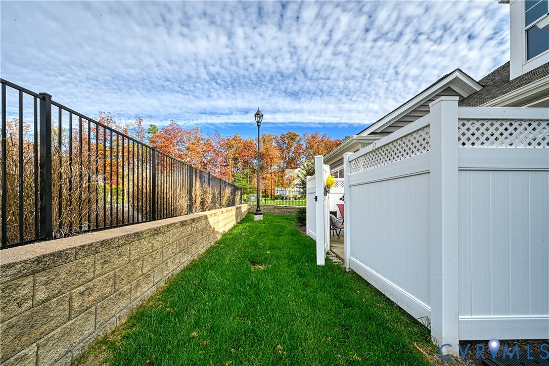 1009 Woodlet Meadow Lane Richmond, VA 23236 - Photo 35 of 44 a view of a house with a yard
