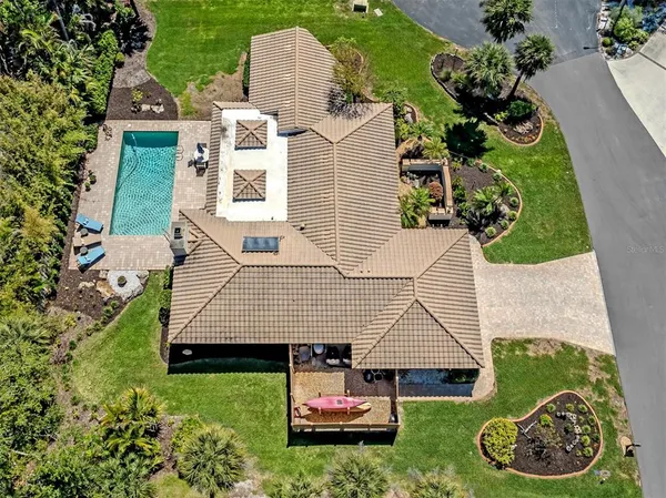an aerial view of a house with garden