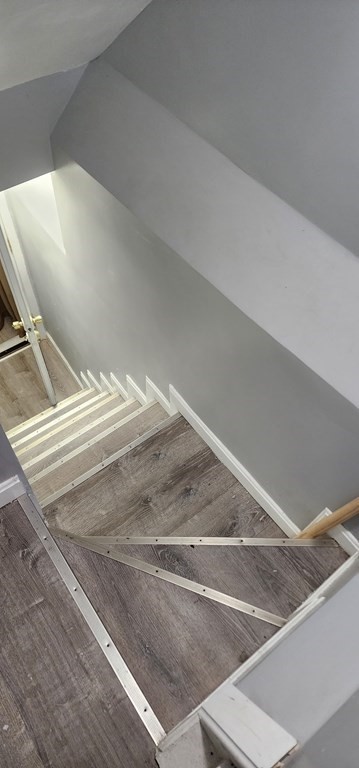 212 Vernon Street Worcester, MA 01607 - Photo 18 of 35 a view of a room with a ceiling fan