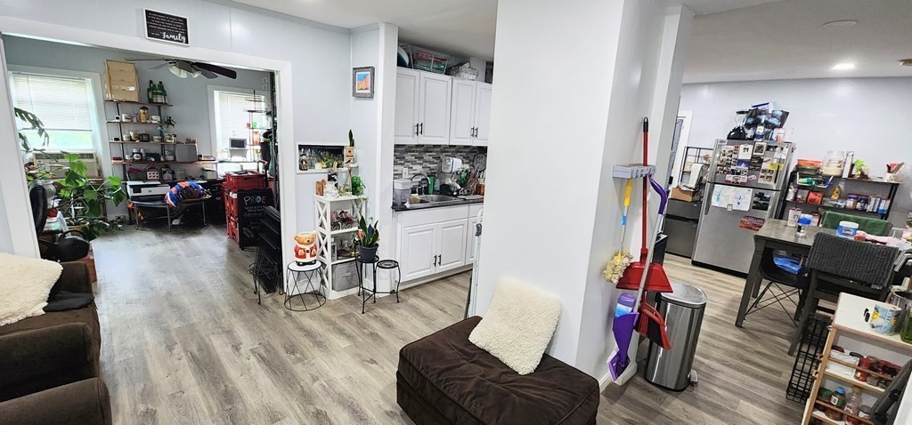 212 Vernon Street Worcester, MA 01607 - Photo 33 of 35 a living room with furniture and wooden floor