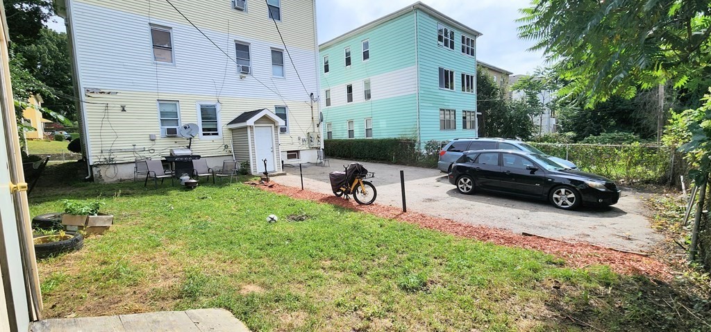 212 Vernon Street Worcester, MA 01607 - Photo 6 of 35 a house view with a garden space