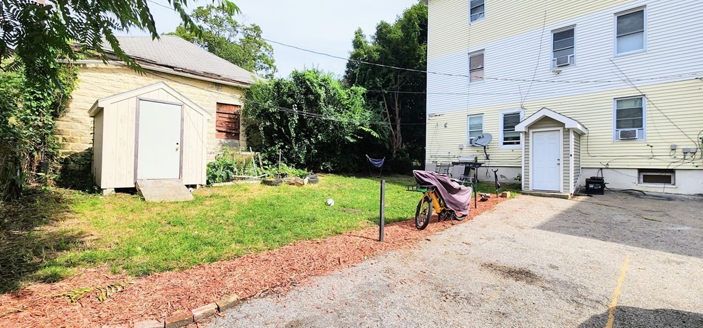 212 Vernon Street Worcester, MA 01607 - Photo 7 of 35 a view of a house with backyard and sitting area