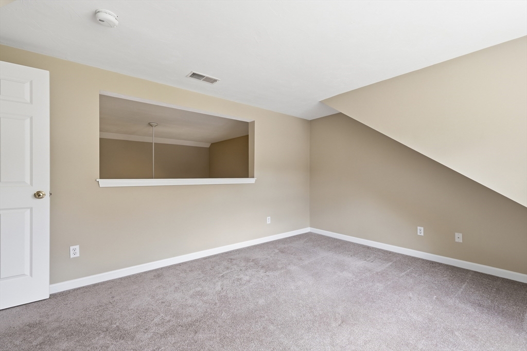 9 Rock Marsh Road, Unit B Wareham, MA 02571 - Photo 33 of 41 a view of an empty room with a window