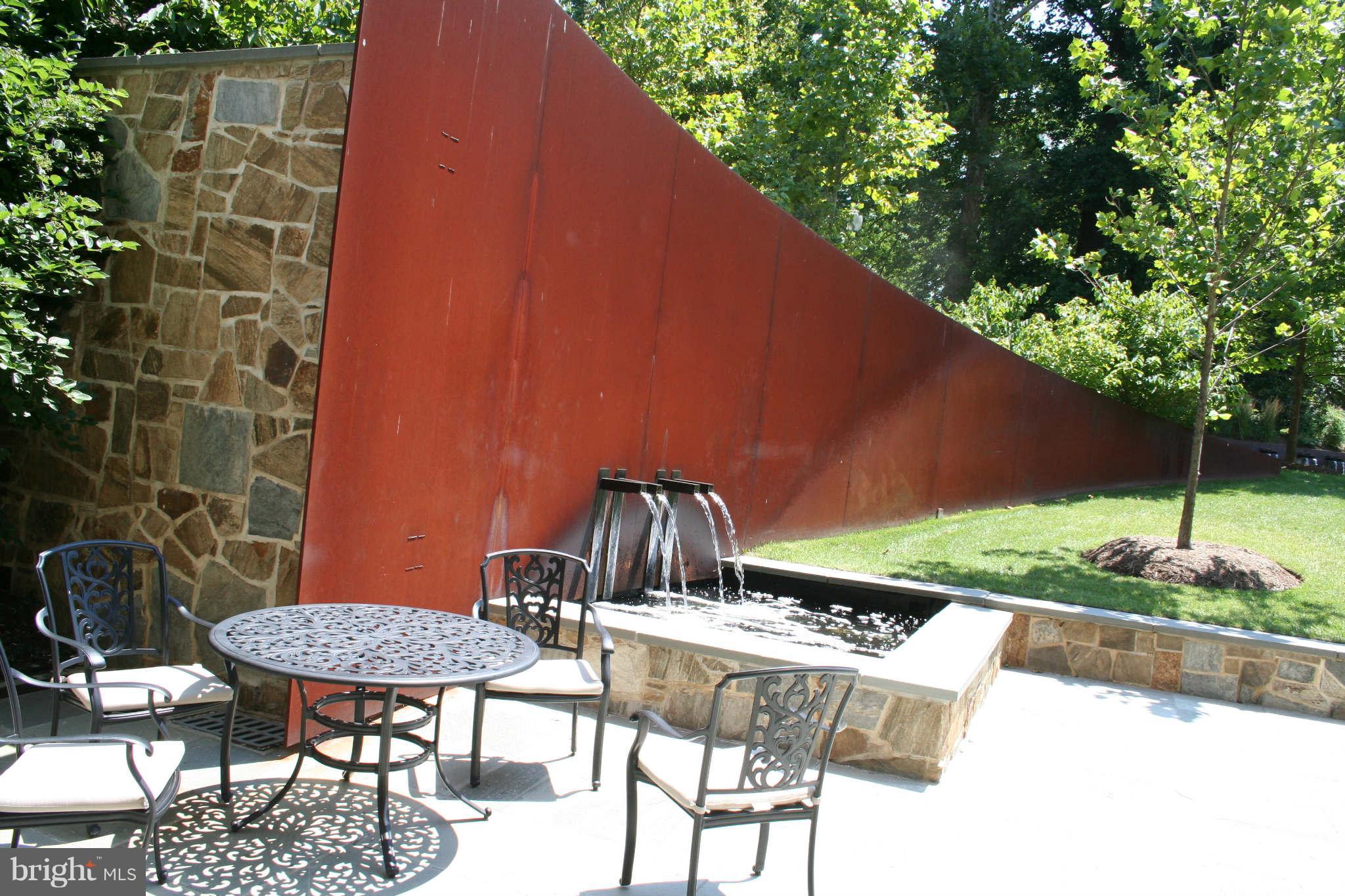 4301 Military Road Northwest, Unit 514 Washington, DC 20015 - Photo 18 of 29 a view of balcony with table and chairs