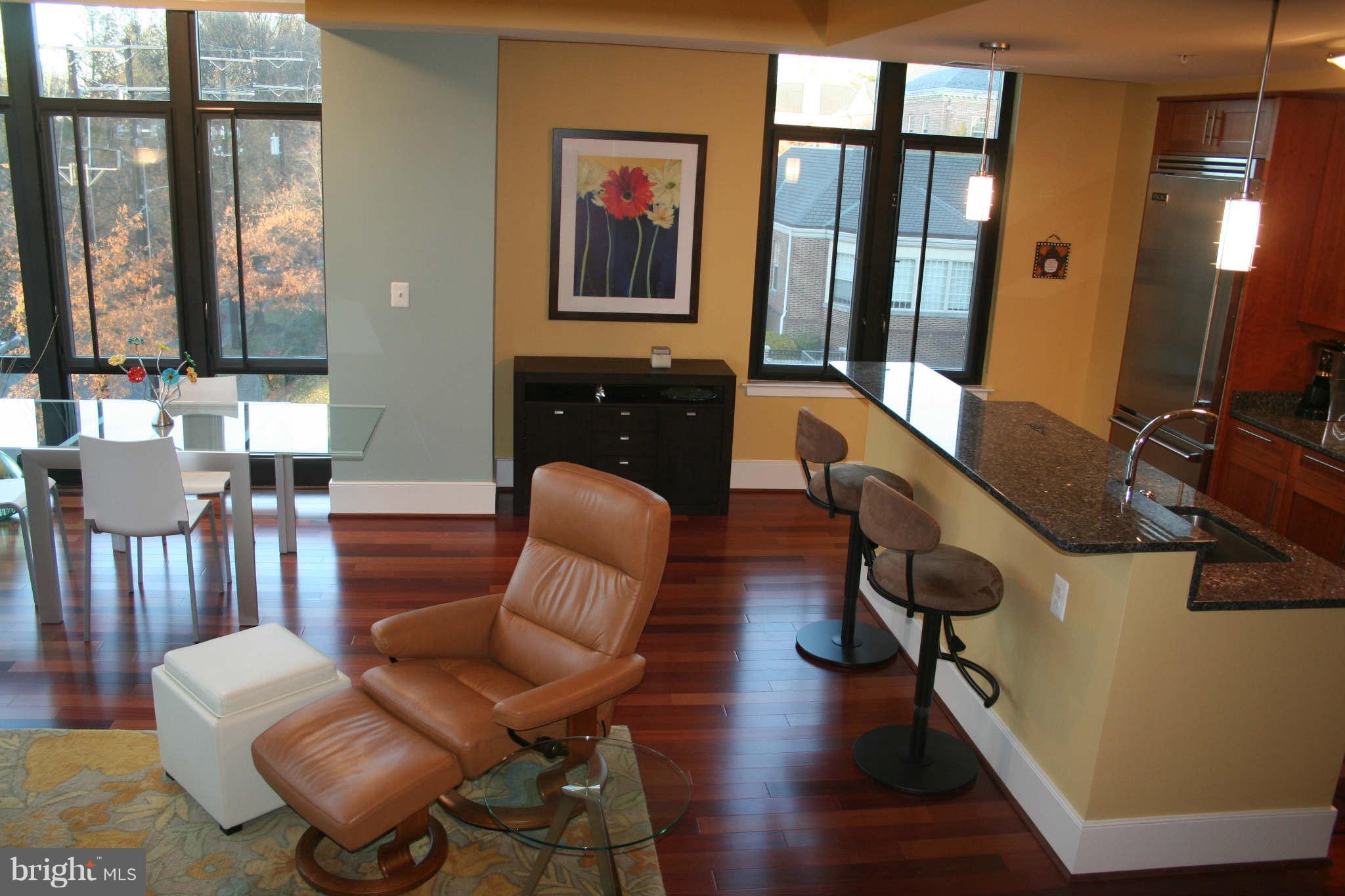 4301 Military Road Northwest, Unit 514 Washington, DC 20015 - Photo 7 of 29 a living room with furniture