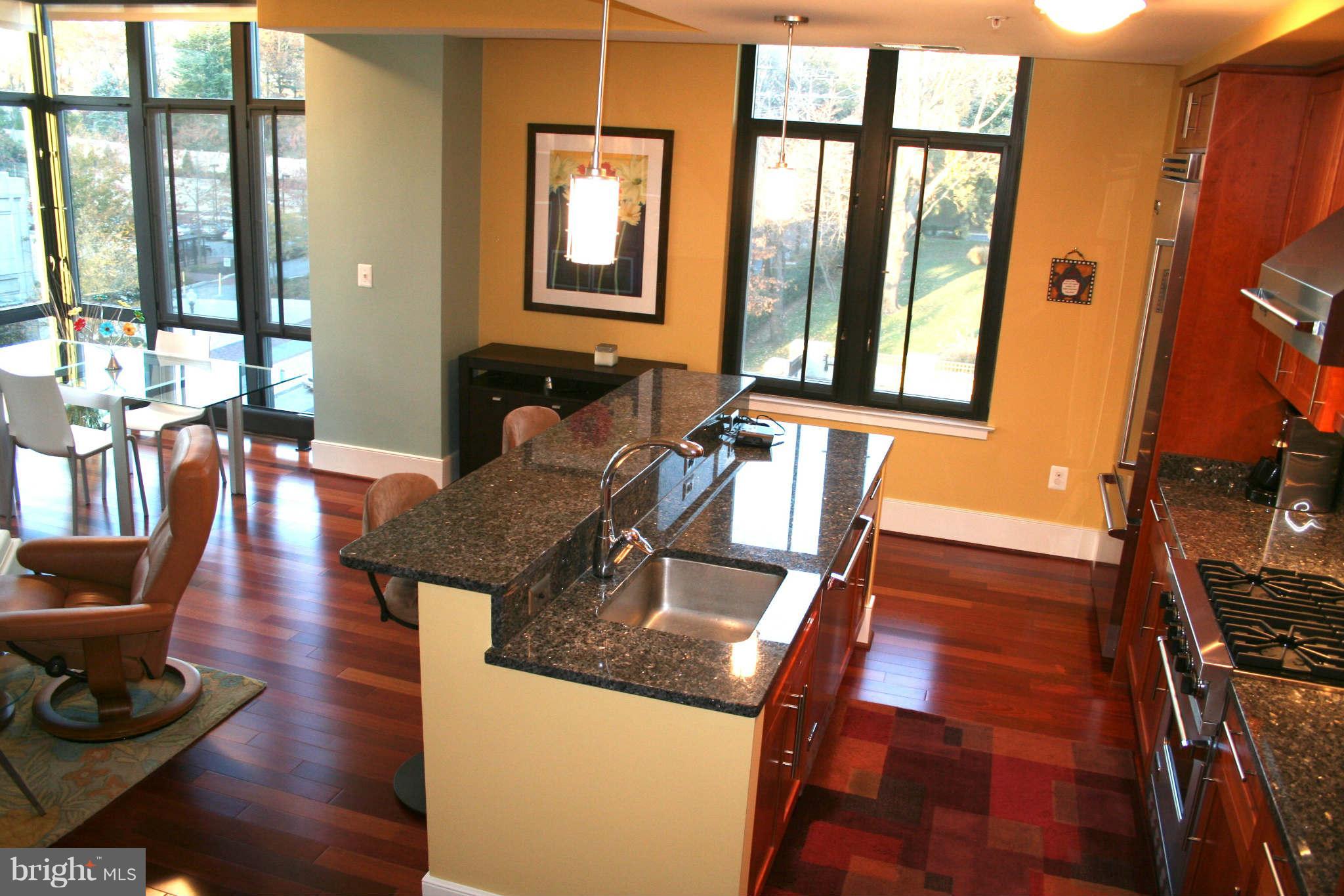 4301 Military Road Northwest, Unit 514 Washington, DC 20015 - Photo 8 of 29 a living room with furniture and a window