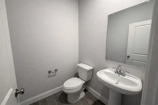 a bathroom with a sink and a toilet