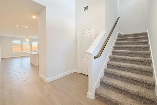 a view of entryway with wooden floor