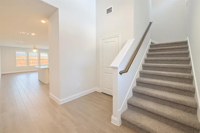 a view of entryway with wooden floor