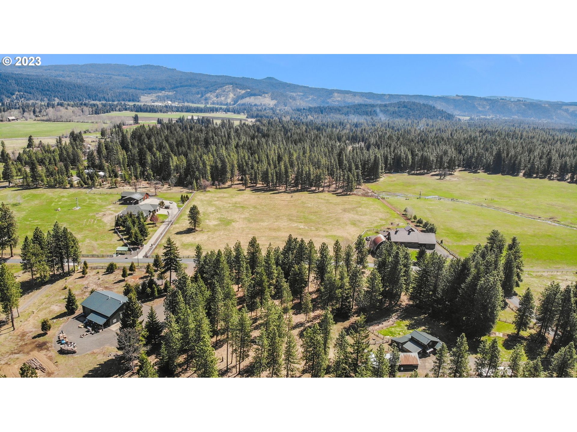 69 Jennings Road Trout Lake, WA 98650 - Photo 28 of 38 a view of a city with mountains in the background