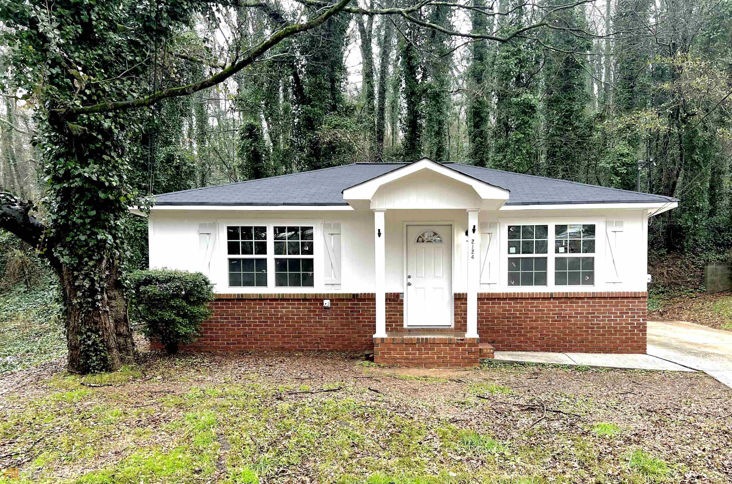 2124 Southern Street Northeast Rome, GA 30161 - Photo 1 of 1 front view of a house with a yard