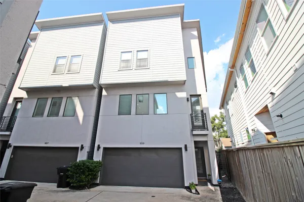 a front view of a house with a garage