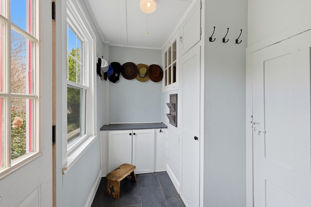 8 Linden Street Marblehead, MA 01945 - Photo 17 of 41 a view of a livingroom with wooden floor and windows