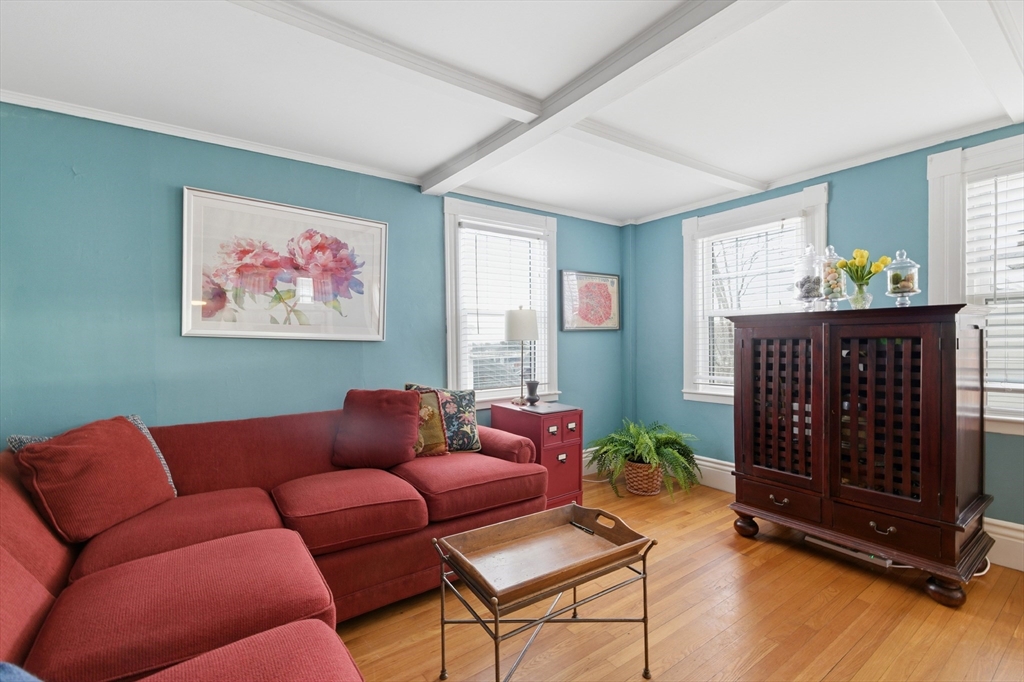 8 Linden Street Marblehead, MA 01945 - Photo 19 of 41 a living room with furniture a fireplace and a window