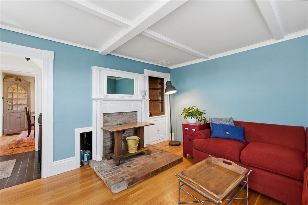 8 Linden Street Marblehead, MA 01945 - Photo 20 of 41 a living room with furniture and a fireplace