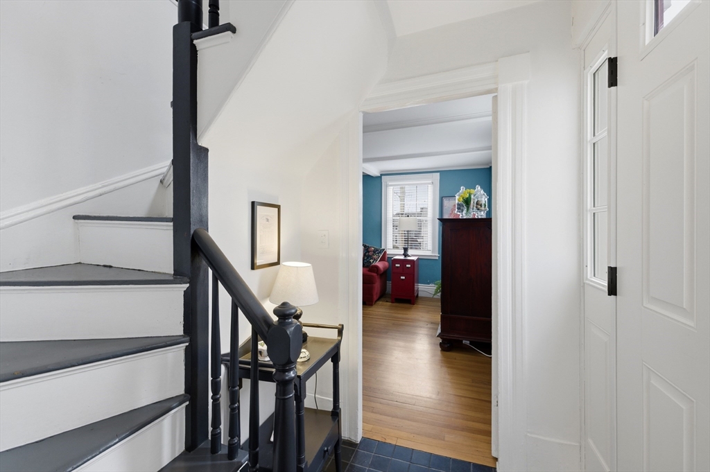 8 Linden Street Marblehead, MA 01945 - Photo 2 of 41 a view of a hallway with wooden floor staircase and livingroom