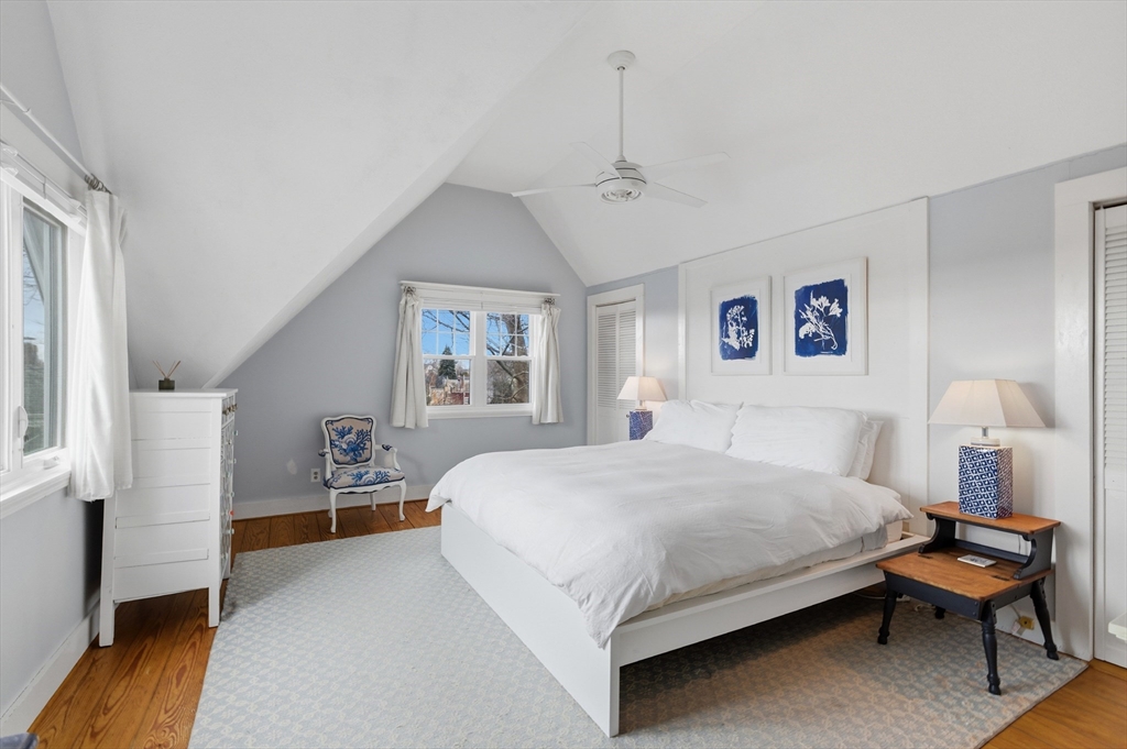 8 Linden Street Marblehead, MA 01945 - Photo 22 of 41 a bedroom with a bed and wooden floor