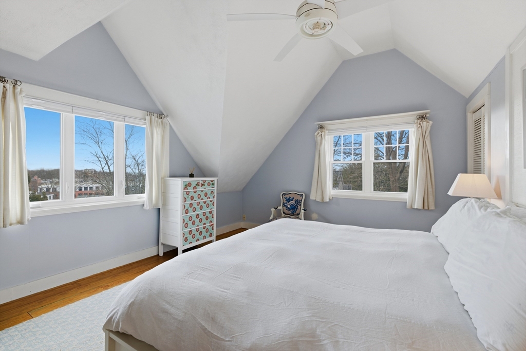 8 Linden Street Marblehead, MA 01945 - Photo 23 of 41 a bedroom with a large bed and a large window
