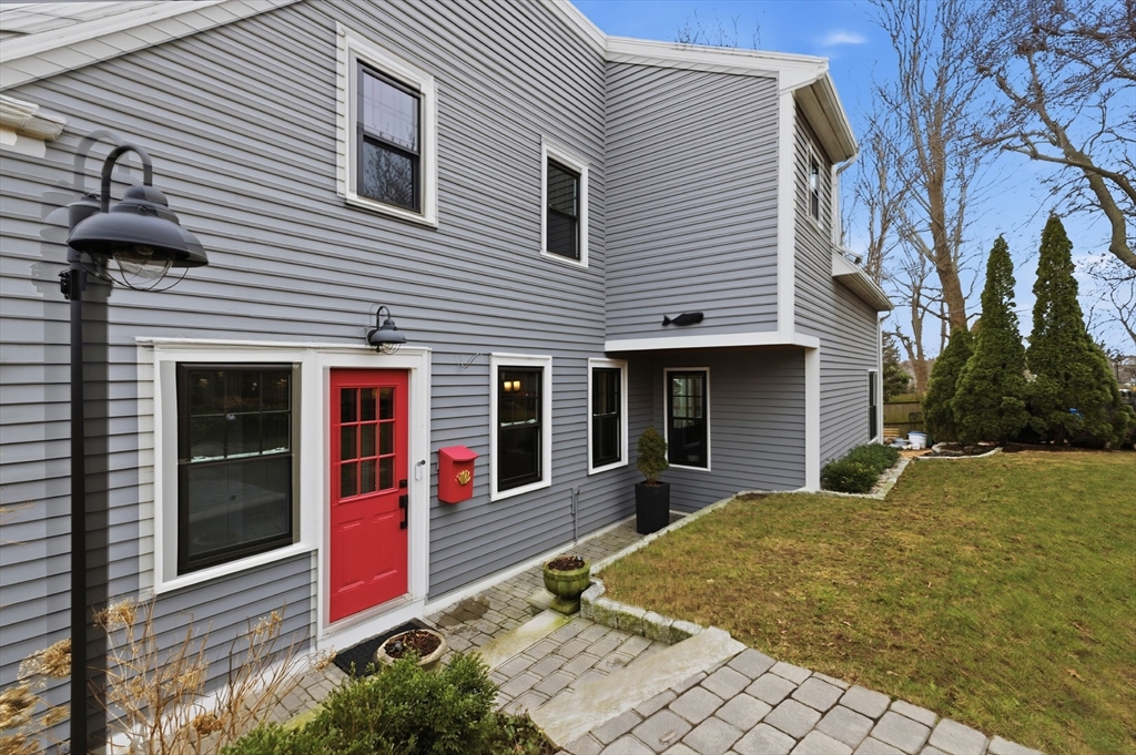 8 Linden Street Marblehead, MA 01945 - Photo 35 of 41 a front view of a house with a yard