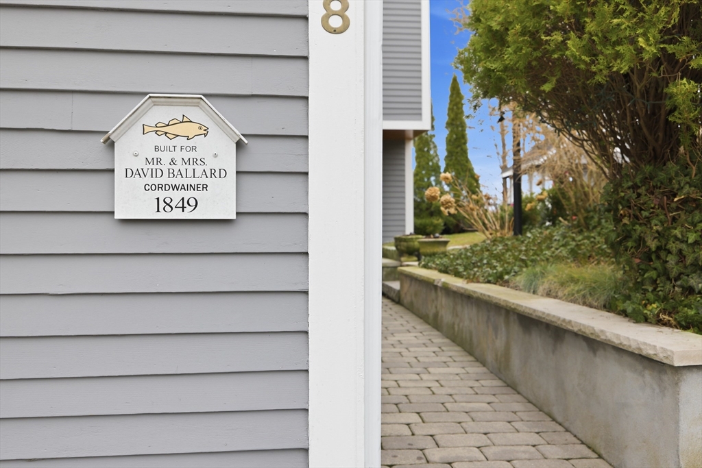 8 Linden Street Marblehead, MA 01945 - Photo 40 of 41 a view of a wooden door with a tree in front of it